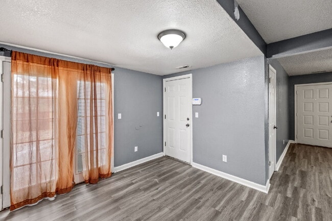 Building Photo - Charming Two-Story Home with Fenced Yard & Cozy Fireplace — Pet-Friendly!