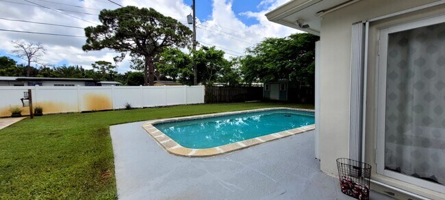 Building Photo - 3/2 with pool and outside