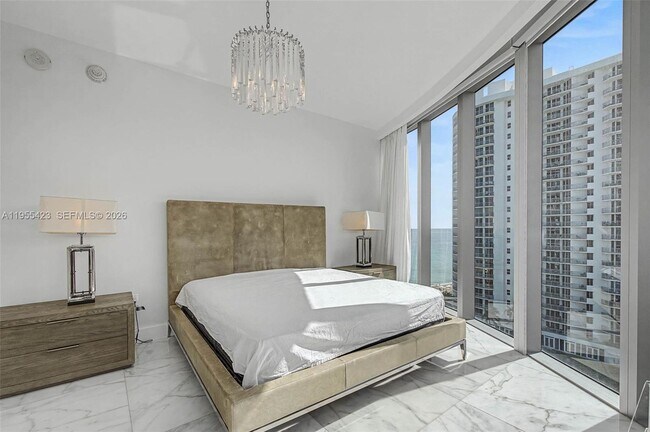 Building Photo - 17475 Collins Ave