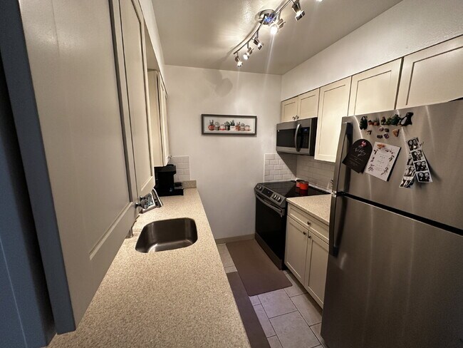 Building Photo - Available June 1st! "Chic & Cozy 1-Bed Furnished Condo in Denver's Desirable Hale Neighborhood! P...