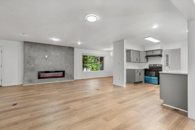 Building Photo - 4BR/3BA Updated Home – Quiet Cove + Fenced Yard!