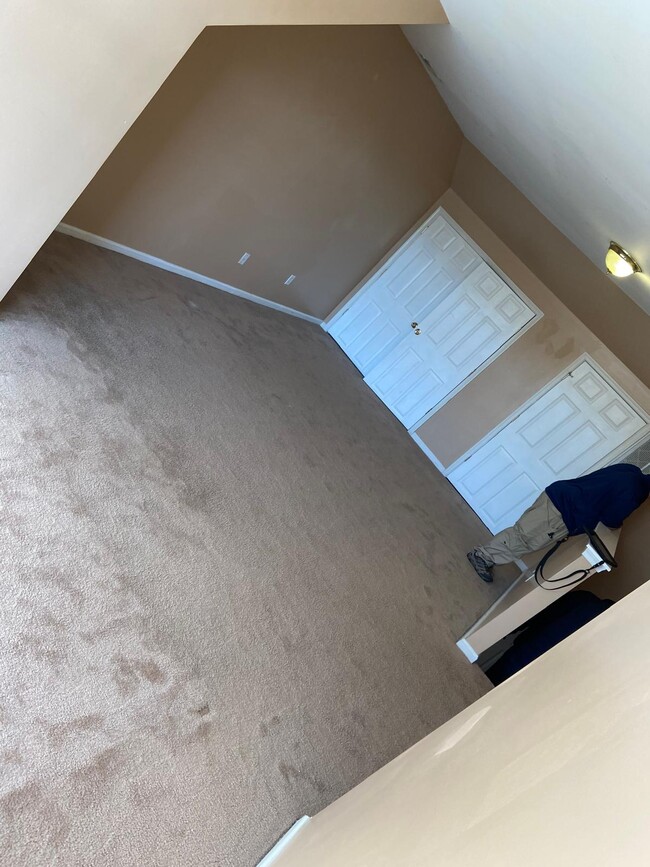 Removed carpet for laminate tile, new paint (blue) - 403 Georgetown Loop