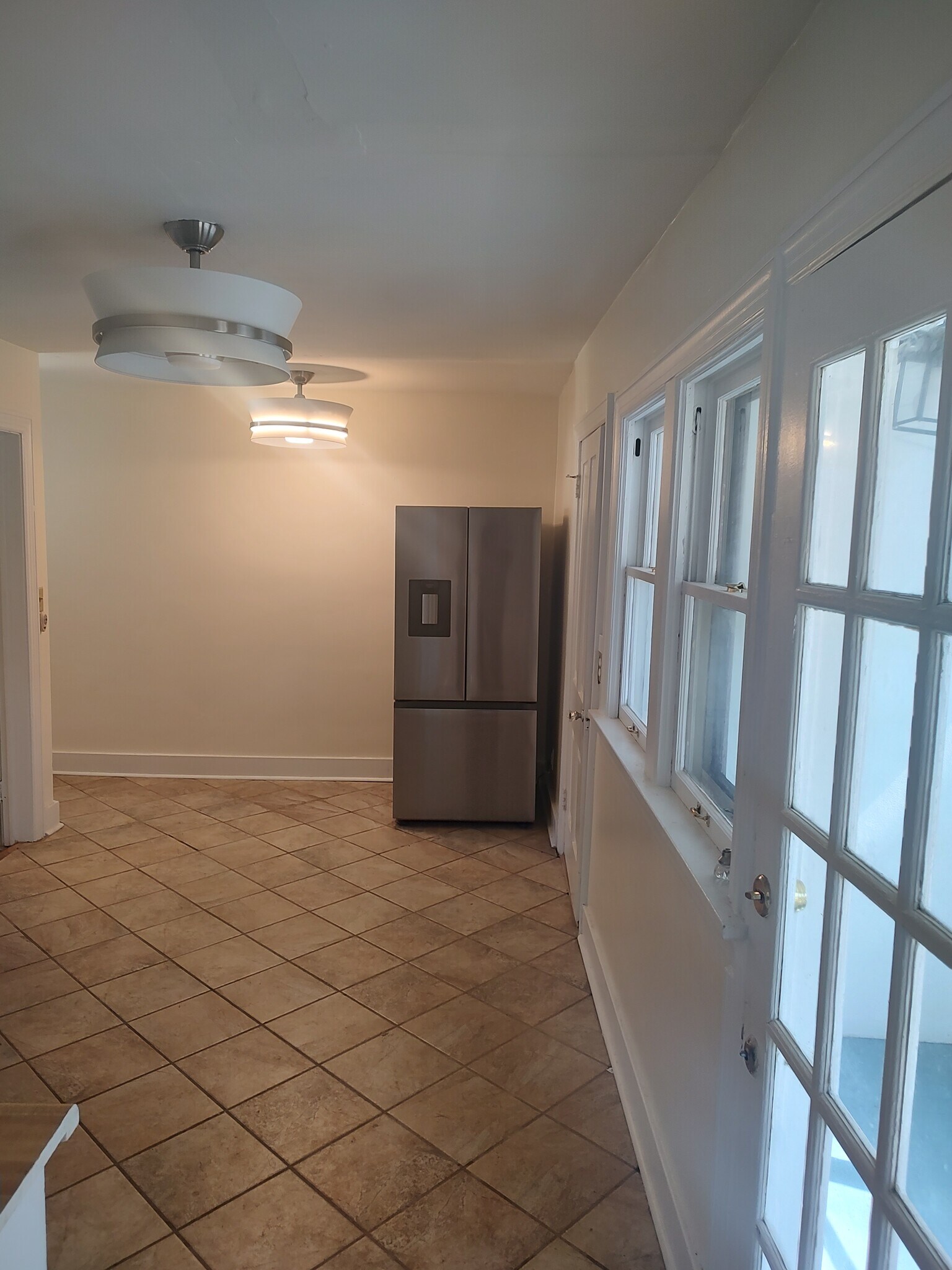 kitchen & three seasons porch eastview to the right - 717 W S St