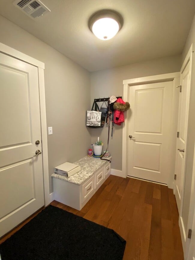 Building Photo - FENCED BACKYARD! BONUS ROOM/OFFICE! SAFE ROOM! THREE CAR GARAGE