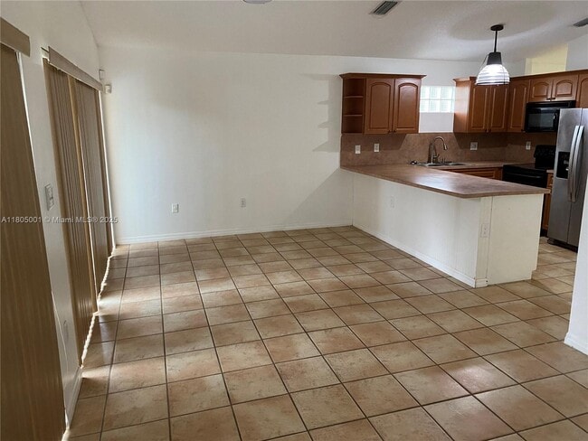 Building Photo - 7601 NW 166th Terrace