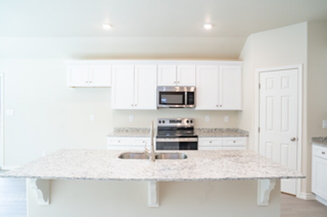 Building Photo - BRAND NEW & Move-In Ready – Make This West...