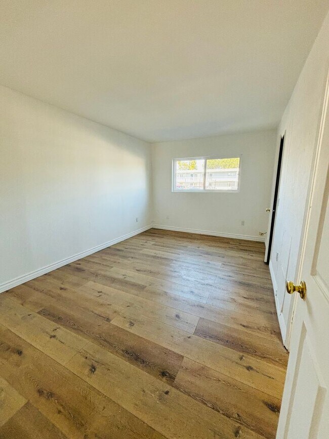 Building Photo - 10635 Sherman Grove Ave