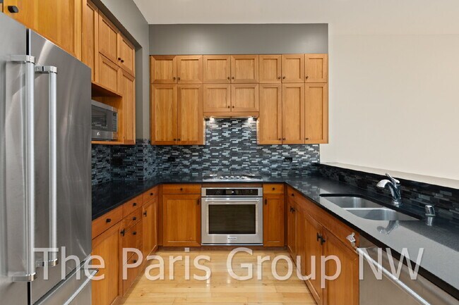 Building Photo - Exceptional 2 Story CapHill Condo * 2 Pkg Spaces, EV Charger & Rooftop Views