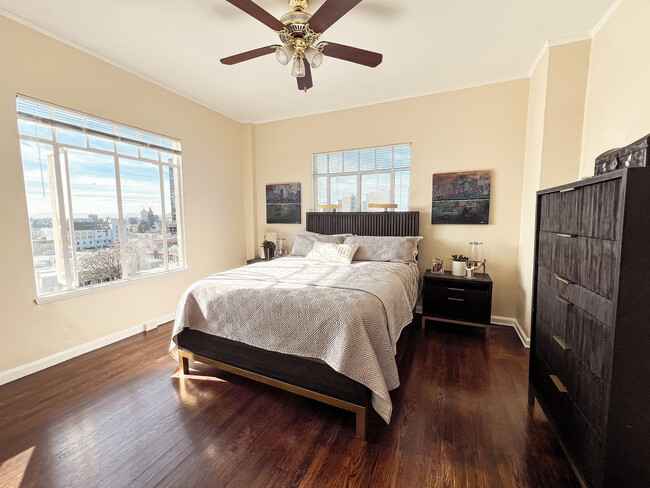 Bedroom with views of lake Merritt and Downtown - Bellevue Towers