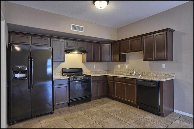 Building Photo - 14302 Pancho Gonzalez Ct