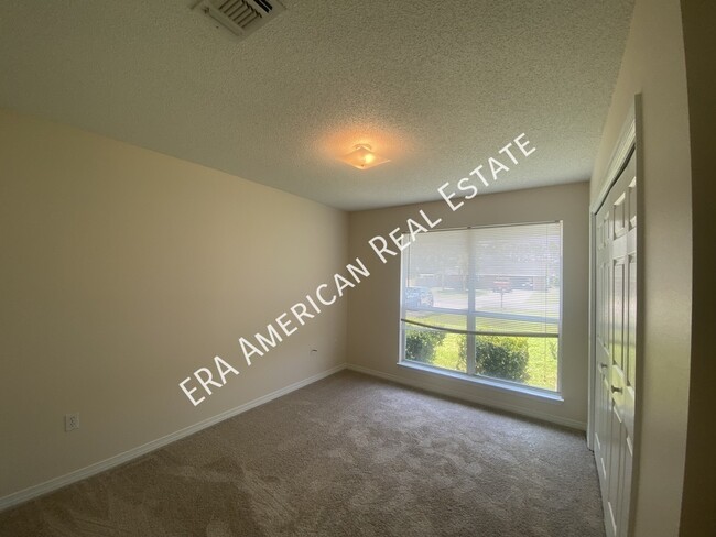 Building Photo - 7468 Woodmont Rd