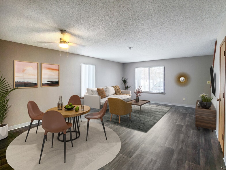 Renovated Three-Bedroom Apartment Living Room at Prairie West in Ames, IA - Prairie West