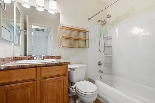 Building Photo - Freshly Updated 2-Bedroom Condo in Gated Lakeshore at Andersen Springs – New Paint & New Carpet!