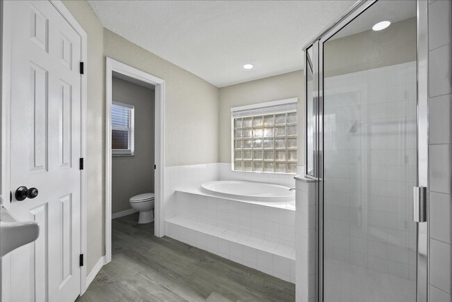 Building Photo - Beautifully remodeled home is situated in ...