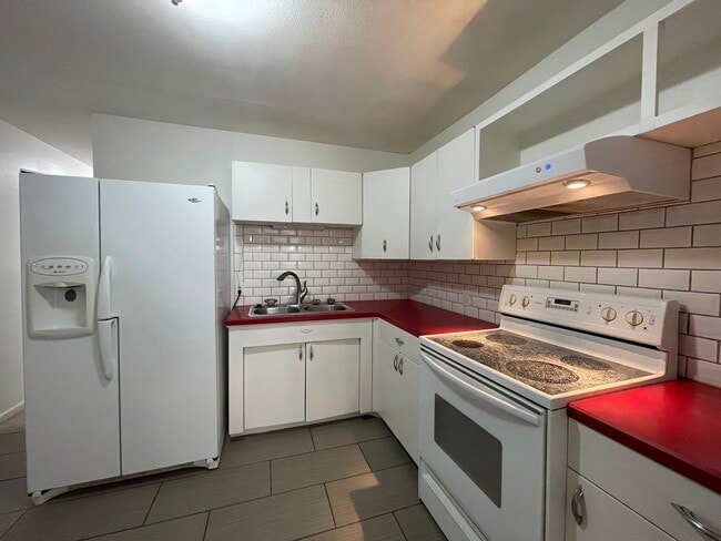 Building Photo - Your New Snyder Sanctuary: Modern Updates, Massive Storage & a Cozy Porch