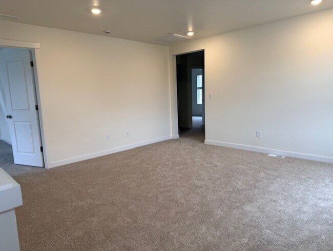 Building Photo - Elegant 4-Bed, 4-Bath 3-Story Home with Gourmet Kitchen & Private Backyard