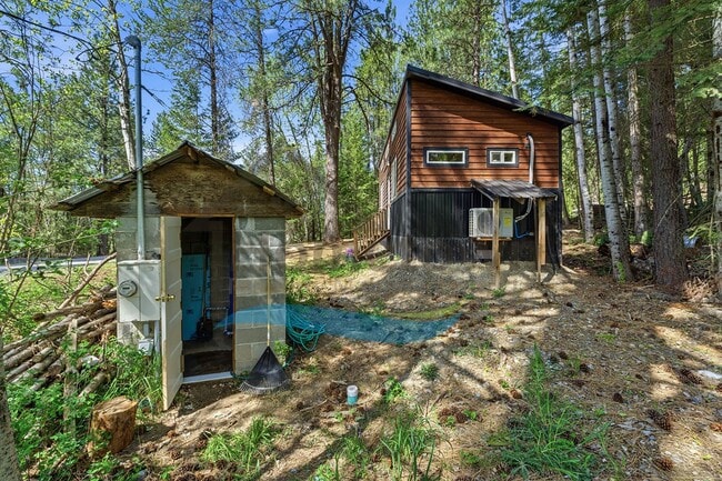 Building Photo - 1 Bedroom 1 Bath Cottage Style Studio Home with Off Street Parking Available in Sagle, Idaho!