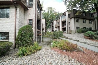 Building Photo - Spacious Condo with Parking, Heat/Hot Wate...