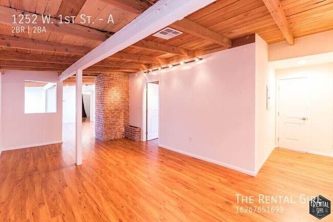 Building Photo - Spectacular 2 Bedroom W/ Exposed Beams & B...