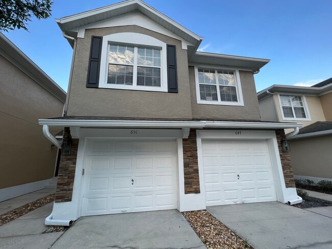 Building Photo - Beautiful 3 Bed 2 Bath with a Den Gated Co...