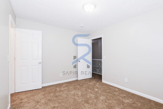 Building Photo - Move in before January 31st and choose your reward: a $250 Amazon Gift Card or a 55" Smart TV!