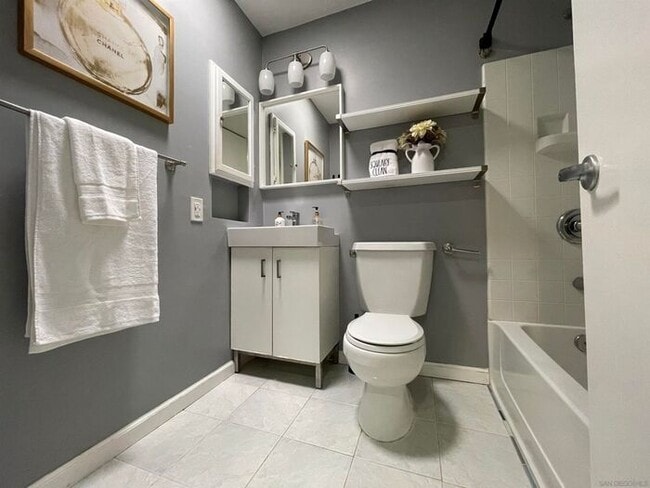 Building Photo - Updated Gated Condo with Pool Access Near SDSU & Shopping