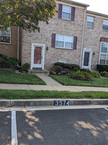 Front view w/assigned parking in front of the house - 3574 Lowlen Ct