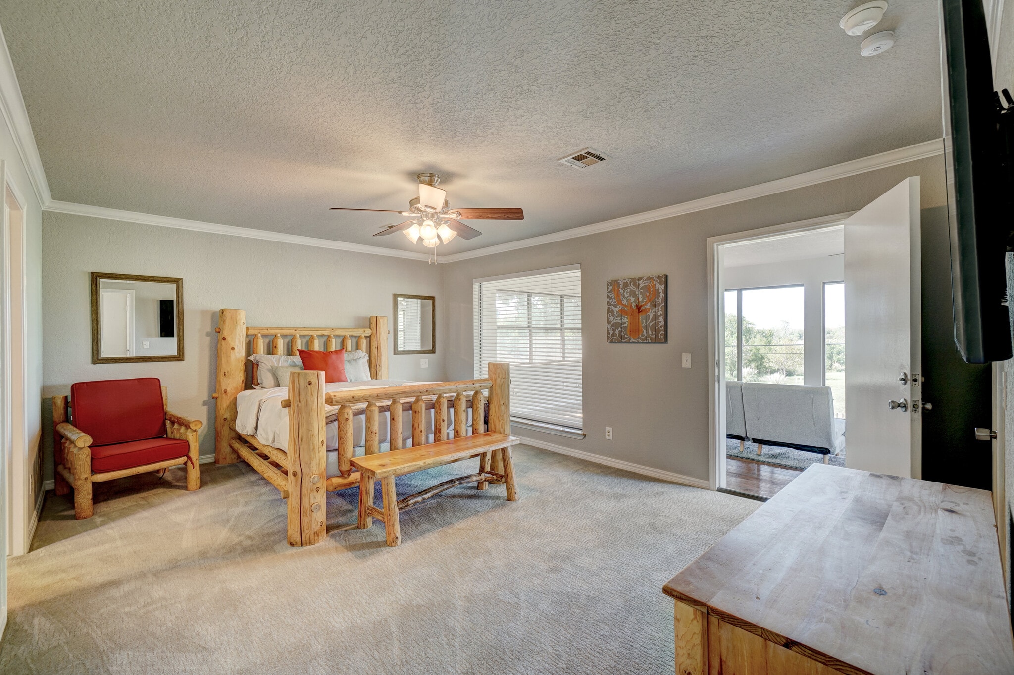 Master Suite (equipped with 58" Smart TV and attached Sun Room). - 3905 NW 70th St