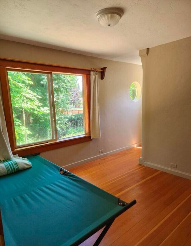 Building Photo - Renovated In-Town Home with Creek & Garage