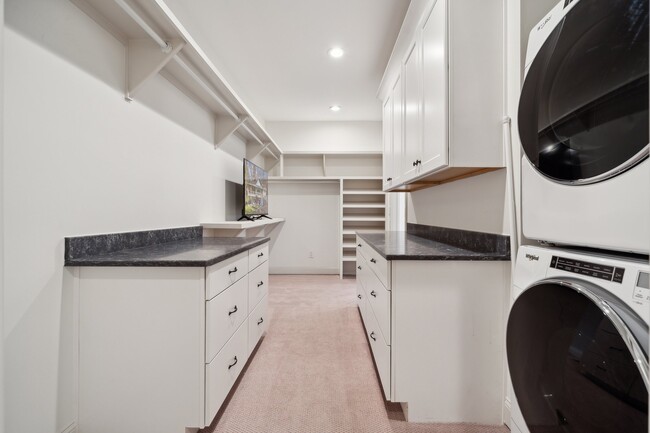 Custom walk-in closet with laundry - 13232 Withers Cove Rd