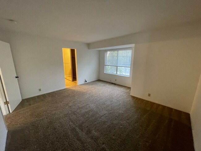 Building Photo - Large three-bedroom condo with huge Living...