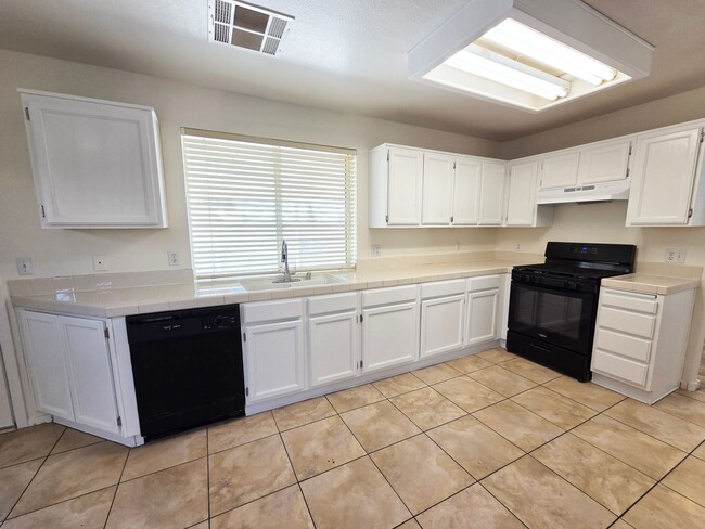 Building Photo - Spacious 4-Bedroom Corner Lot Home with Covered Patio