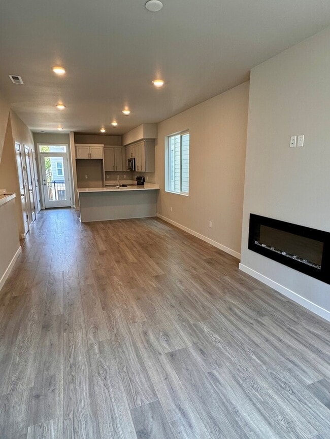 Building Photo - Gorgeous New Construction Home w/LVP Flooring, SS Appliances, W/D, Fireplace & MORE!