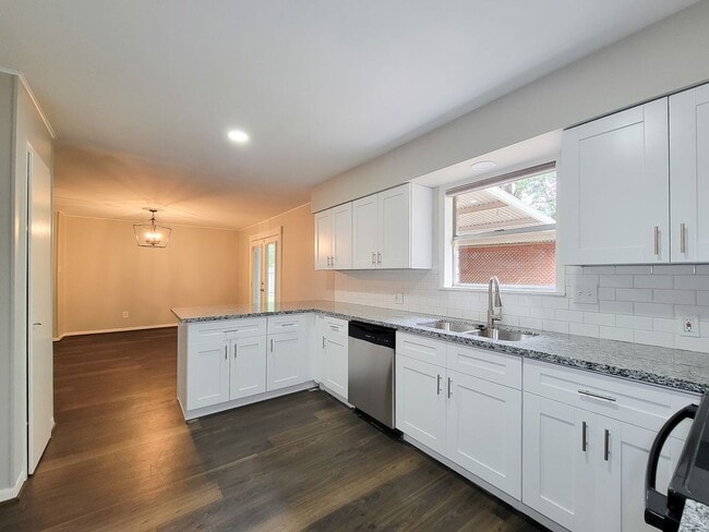 Building Photo - Welcome to your dream rental! This meticulously remodeled 3-bedroom, 2-bathroom home in the heart...