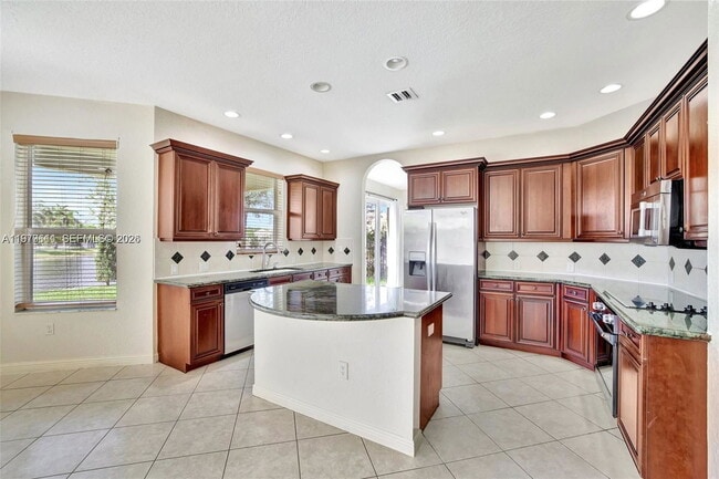 Building Photo - Southwest 51st Street, Miramar, FL 33027 - 5 BR 3.5 BA single-family home