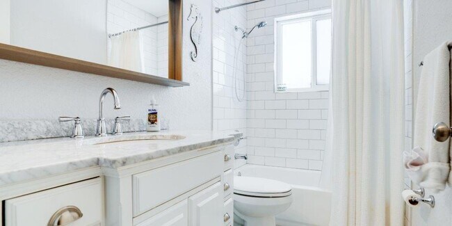 Building Photo - Step Into Sunshine: Modern Charm Meets Coa...