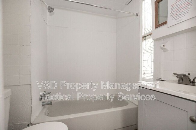 Building Photo - 1583 E 84th St
