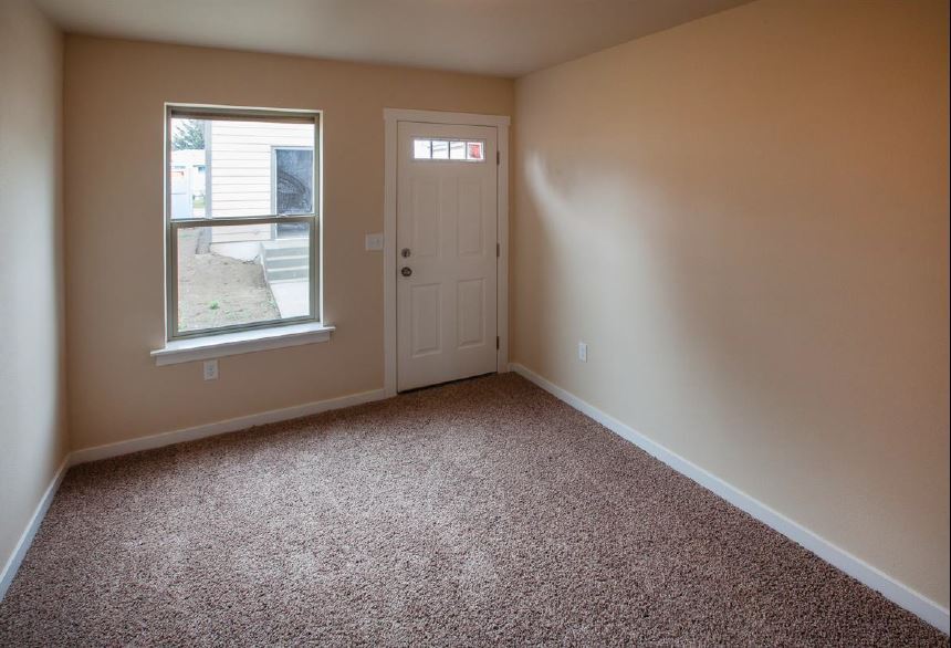 Main floor bedroom 2. - 1220 W Bismark Ave