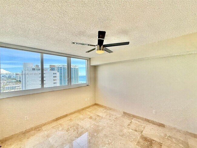 Building Photo - 6422 Collins Ave
