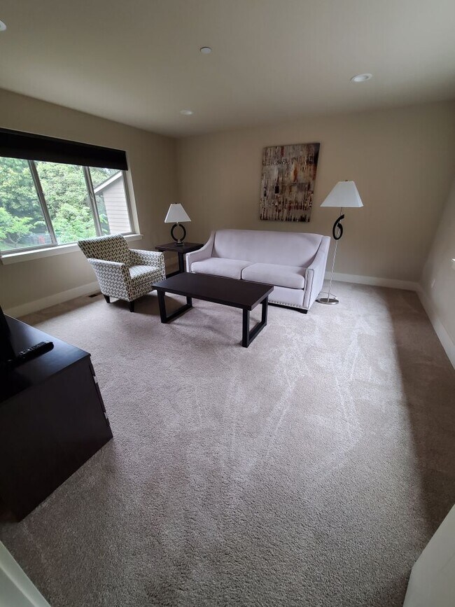 Building Photo - Spacious, Modern Living full of luxurious details!