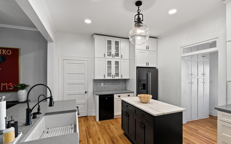 Kitchen with Full Size and Wine Fridge - 245 E University Blvd