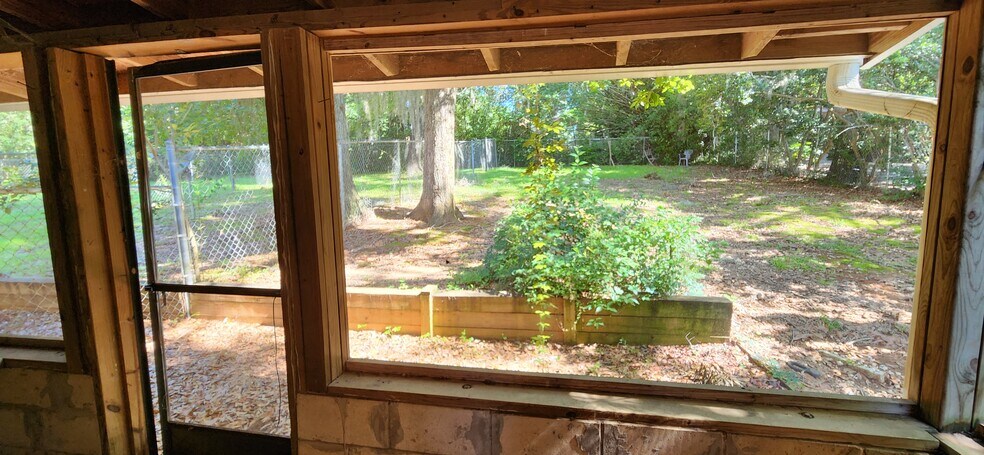 Fenced Backyard - 240 Lake Ella Dr