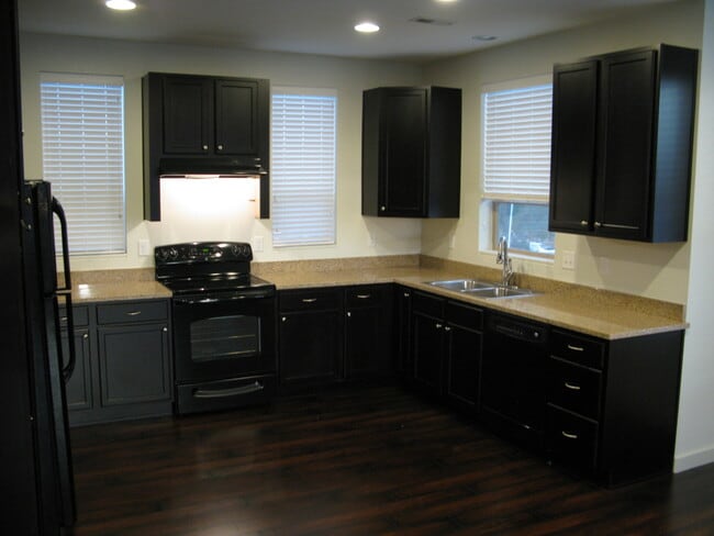Building Photo - Modern End Unit 3 Bedroom Townhome with Solar.