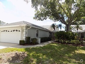 Building Photo - 7724 Palm Aire Ln