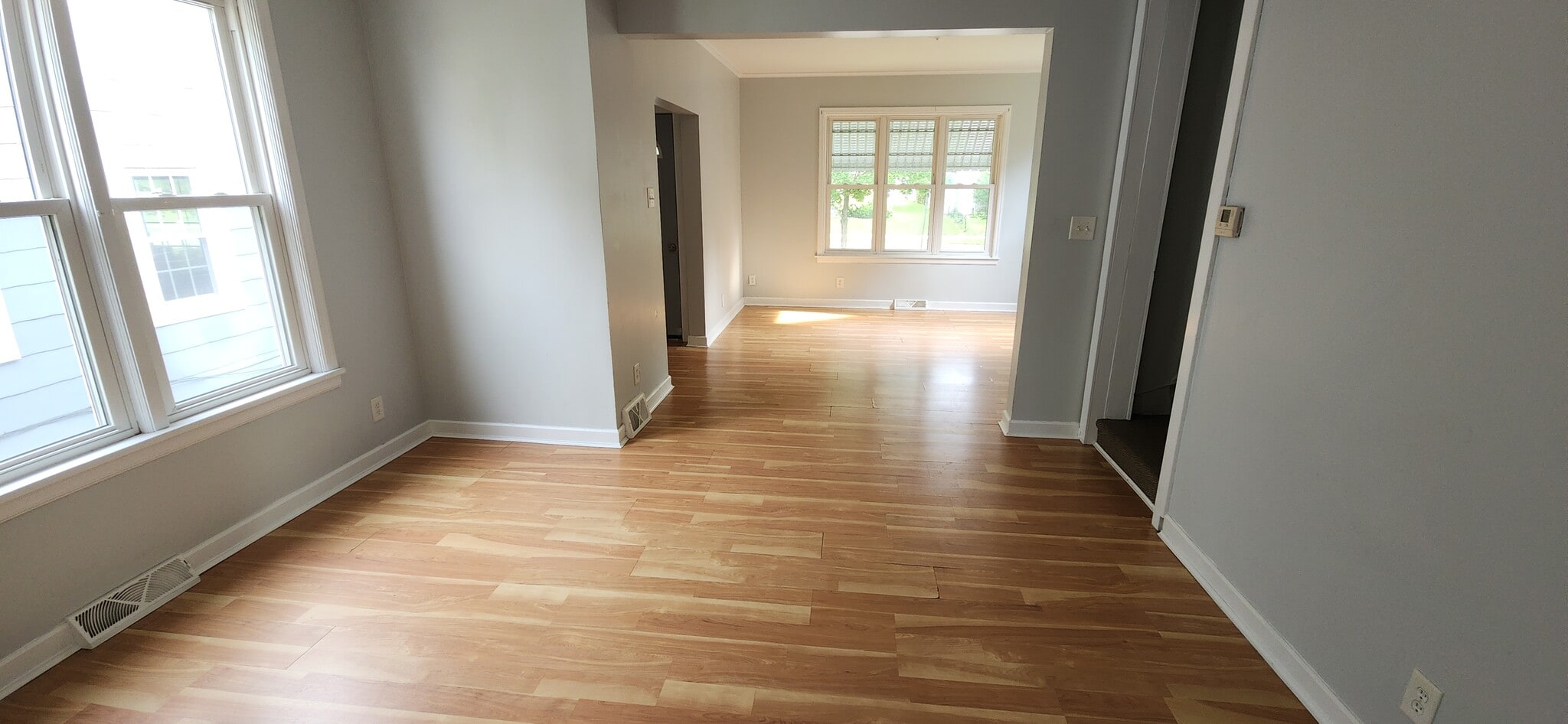 Dining room into the living room - 104 E 2nd St
