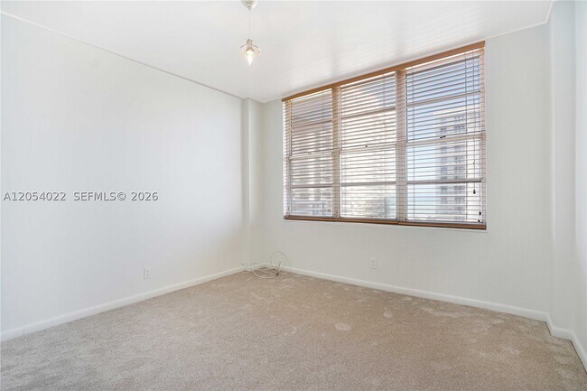 Building Photo - 5700 Collins Ave