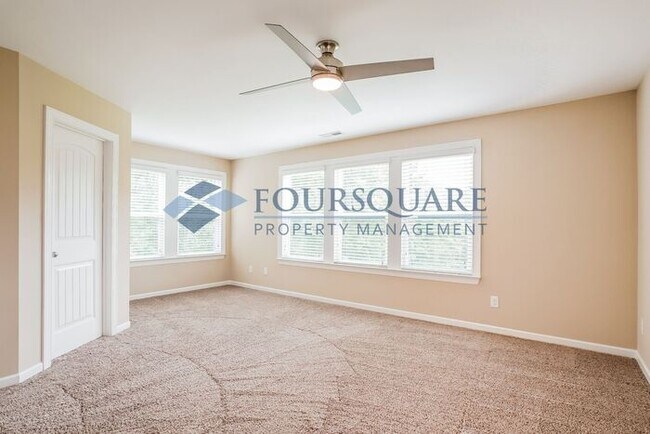 Building Photo - End Unit Townhome | Back Patio With Privac...