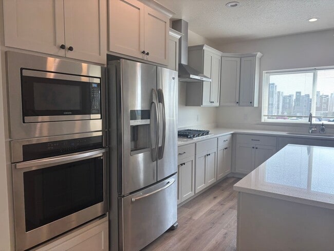 Building Photo - BRAND NEW TOWN HOME READY TO MOVE IN