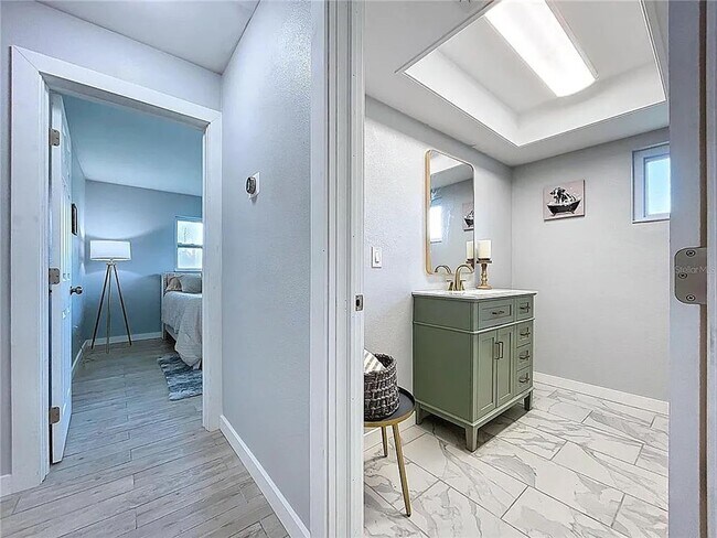 Building Photo - Modern luxury meets Florida charm in this ...