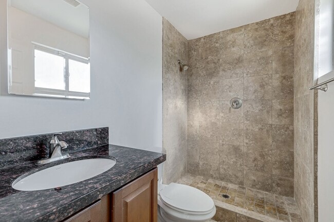 Building Photo - Spacious & Stylish 4/2 – Just  2 Miles fro...